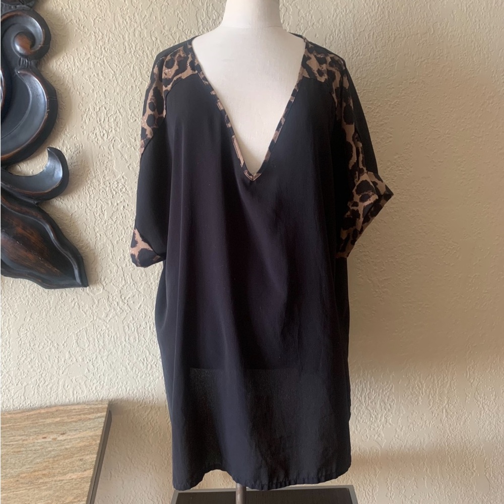 3. Short Sleeve Black and Animal Print Shirt